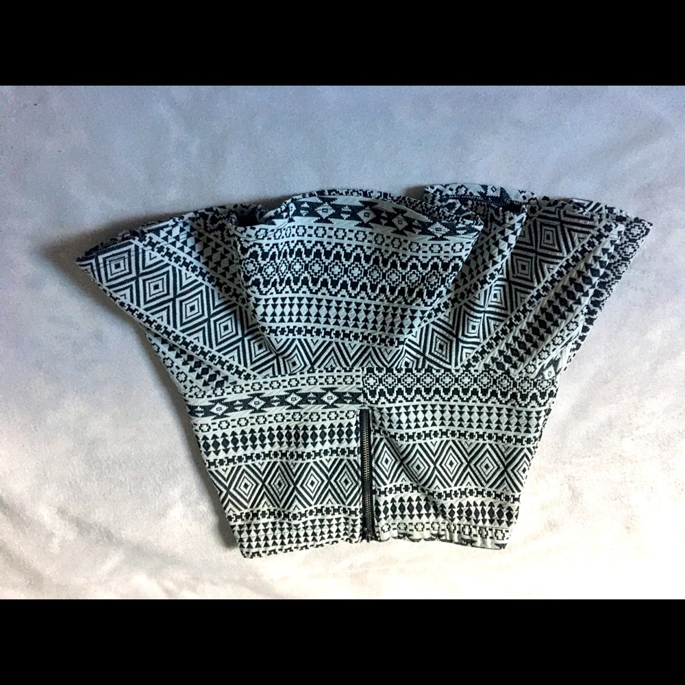 Skirt, shirt, short sweater and/or shorts